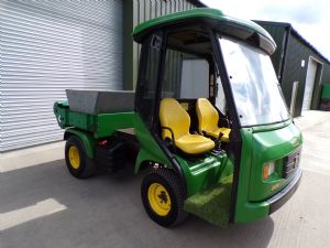 JOHN DEERE PROGATOR 2030 WITH CUSHMAN TD1500 TOPDRESSER & BUCK for sale