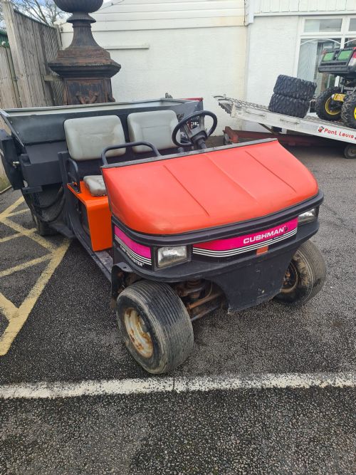 Cushman Turf Truckster with Turfco Mete-R-Matic Topdresser for sale