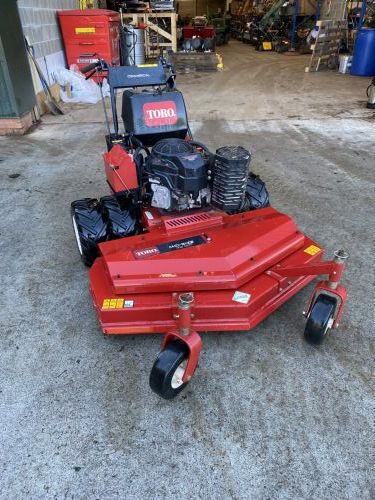 TORO MIDSIZE PEDESTRIAN MOWER WITH 48 for sale