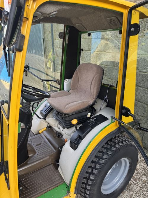 John Deere 2320 2 wheel drive compact tractor with Q Cab for sale